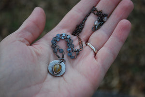 Coin pendant necklace with teardrop rutilated quartz gemstone
