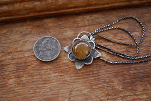 Golden rutilated quartz sterling silver pendant